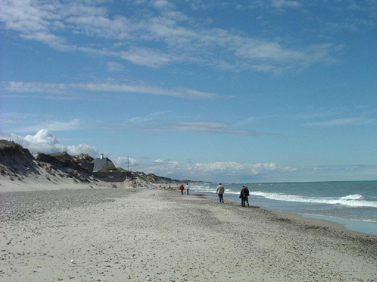 Along the beach westward